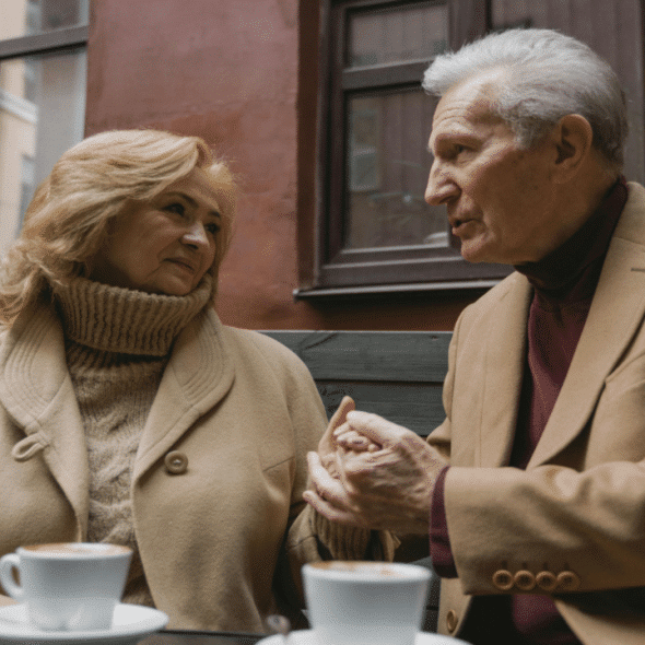 A man holding his date’s hand