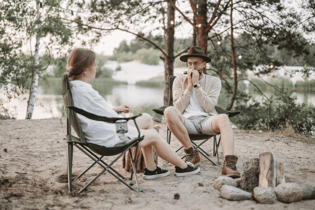 Man playing harmonica for woman