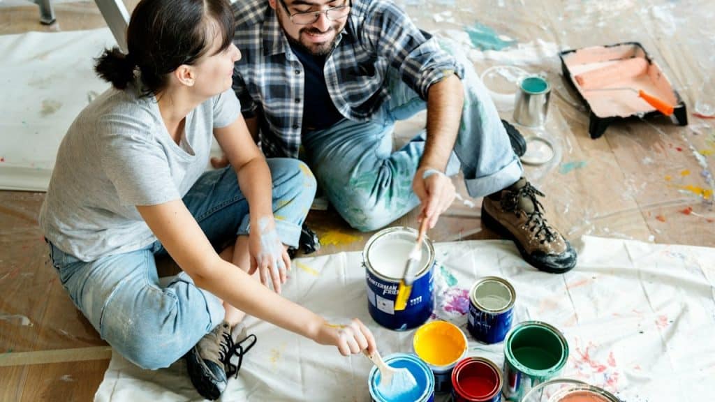 A couple renovating their home.