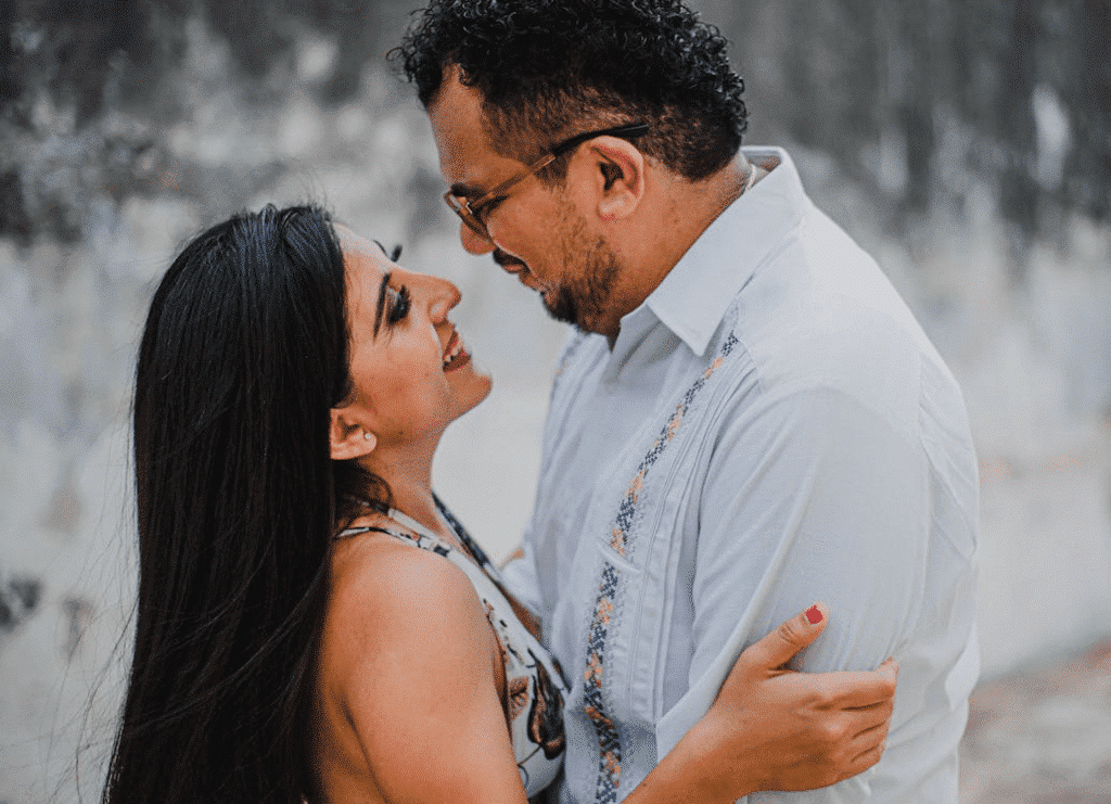 A couple facing each other
