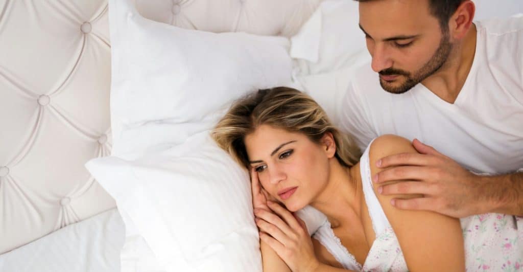 A man checking on with his partner