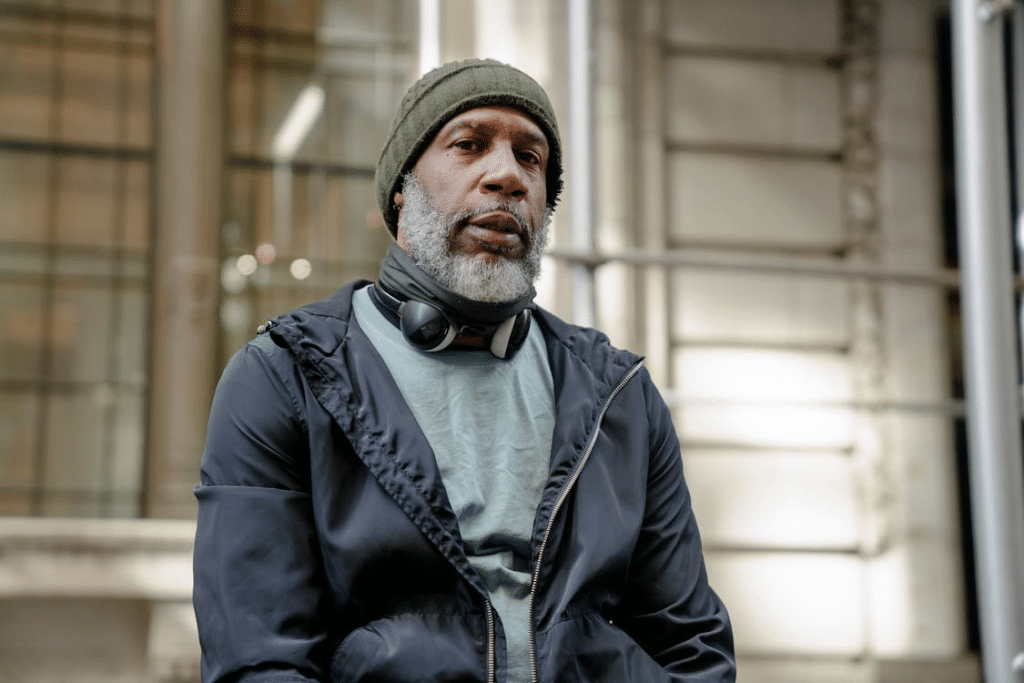 A man wearing a blue jacket