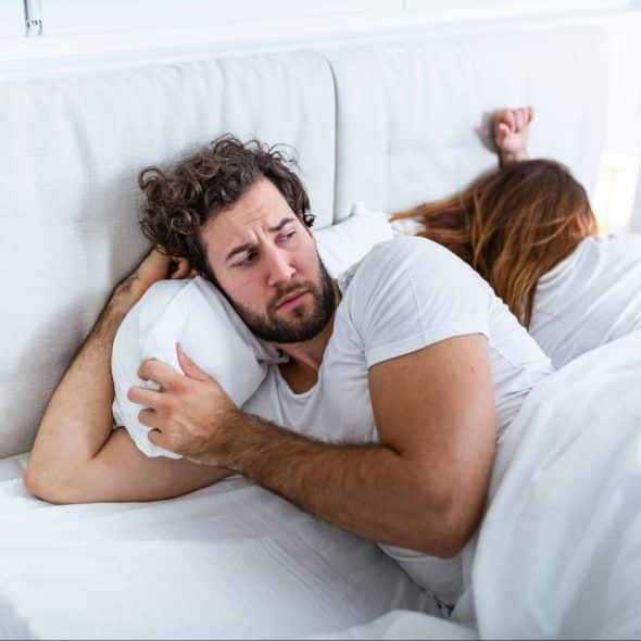 A man checking on a woman