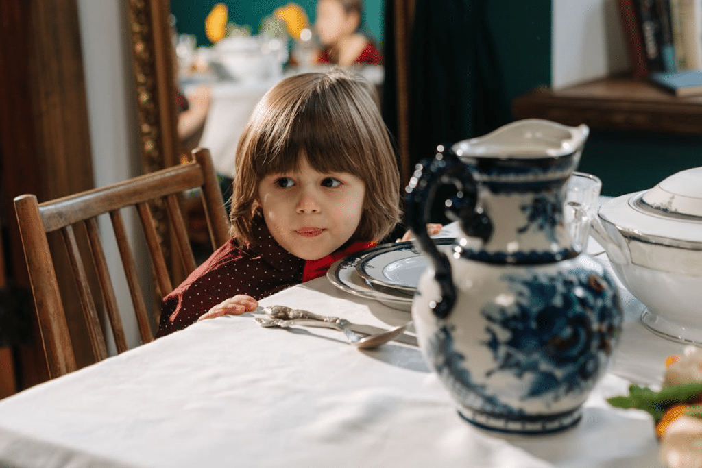 A kid sitting at the table