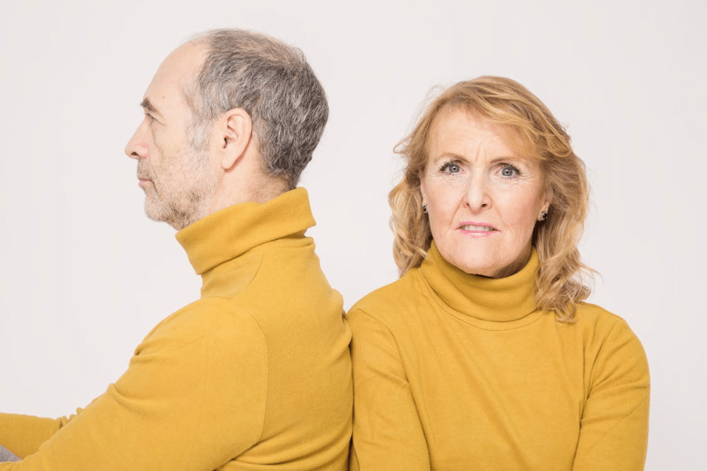 An elderly couple with matching outfits