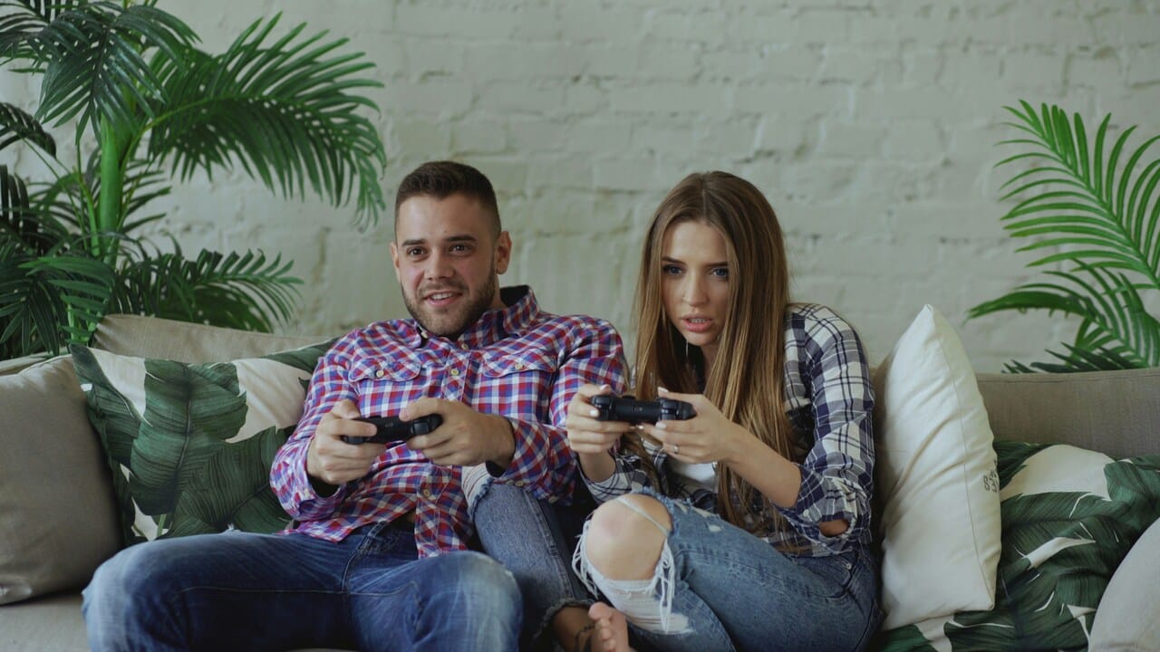 A couple playing video games together