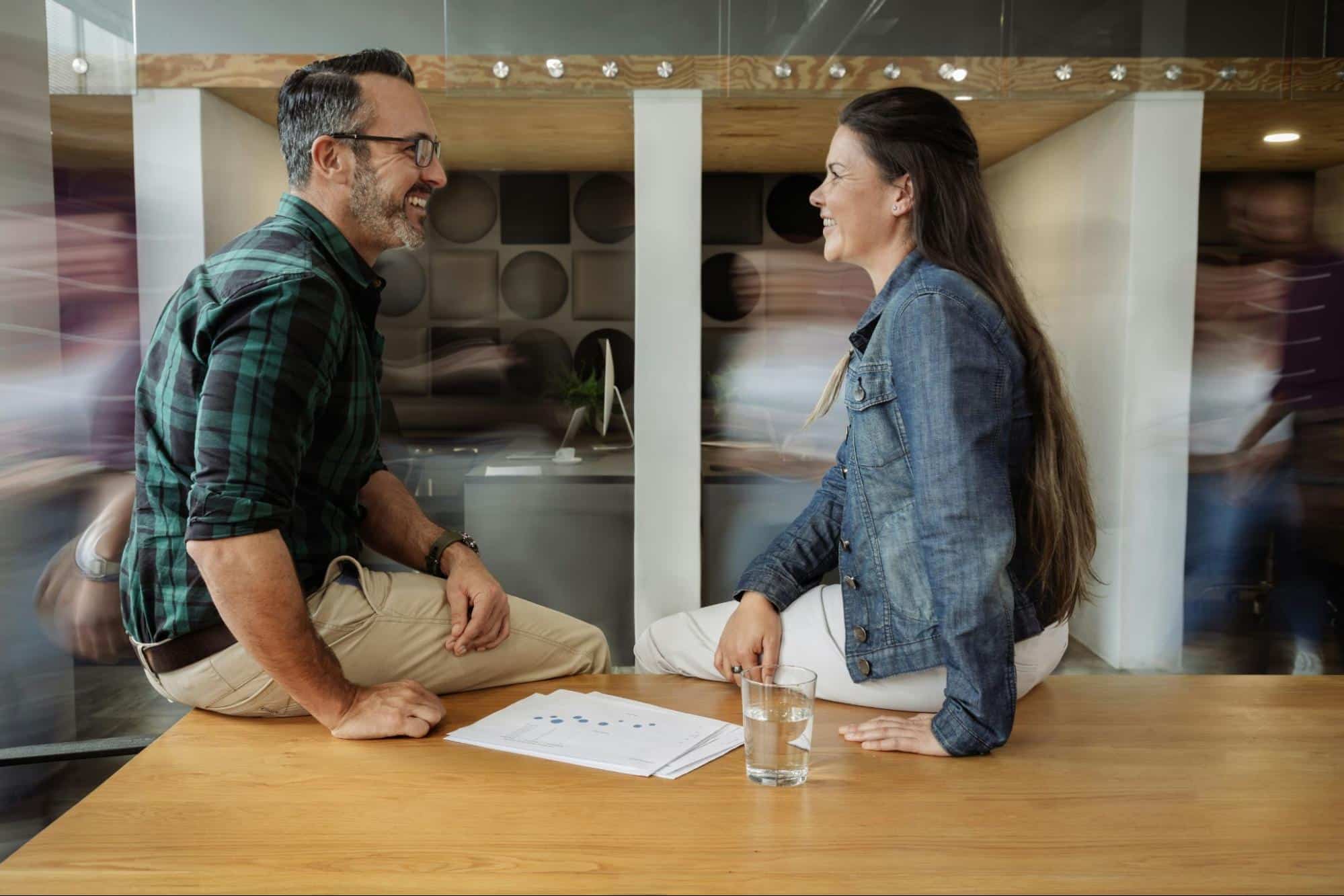 A man and woman talking