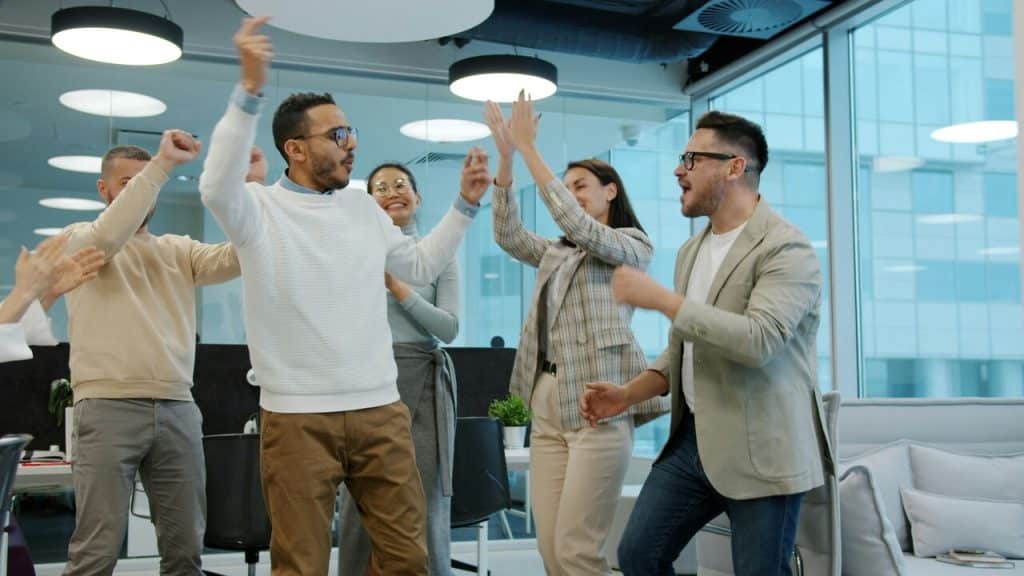 Colleagues celebrating at work 