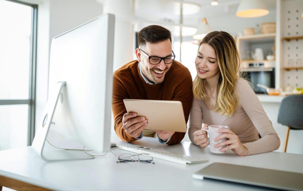 A man sharing something to woman