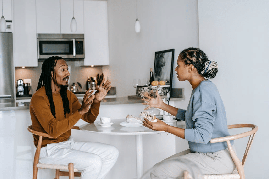 Ethnic couple quarrelling in kitchen