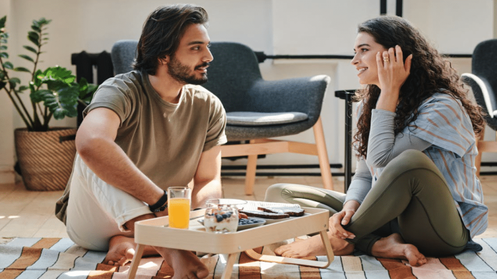 A couple talking during breakfast