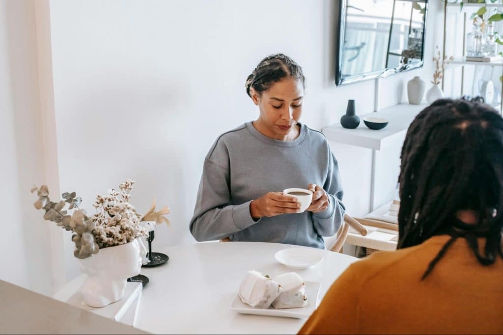 A man and woman having a coffee