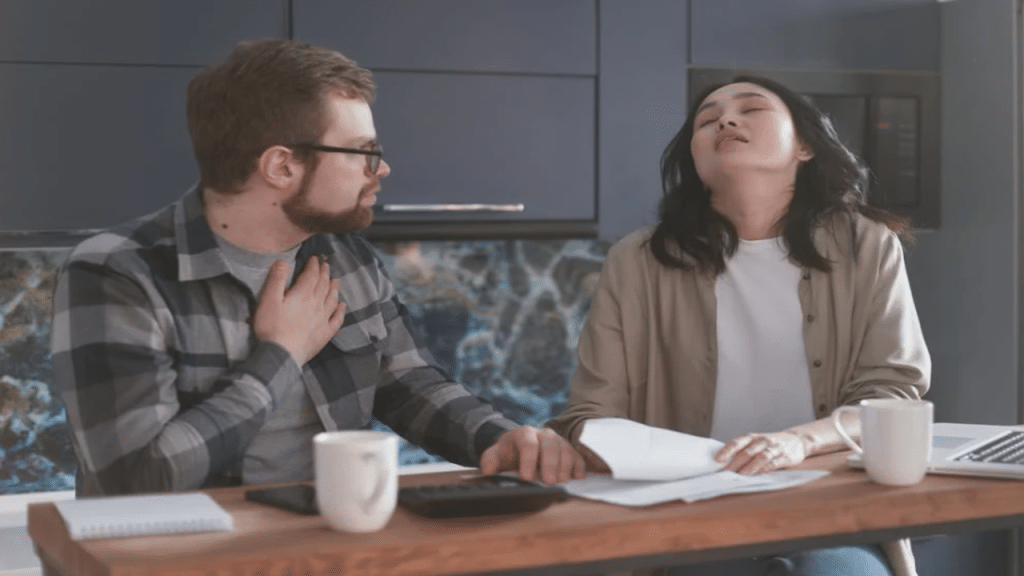 A couple fighting about the bills