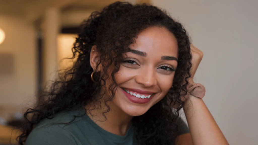 A woman smiling at the camera
