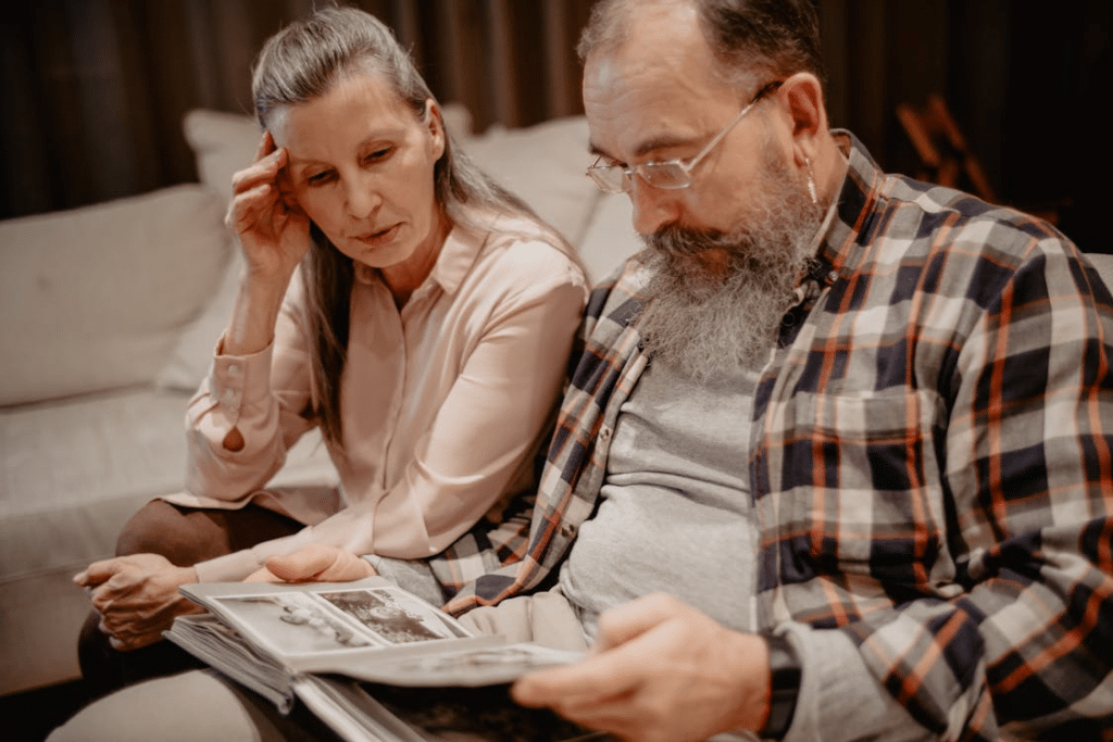 A couple browsing a photo album