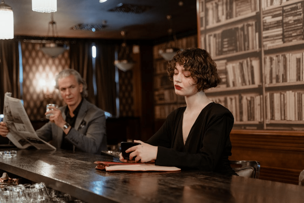 A man and a woman at a bar