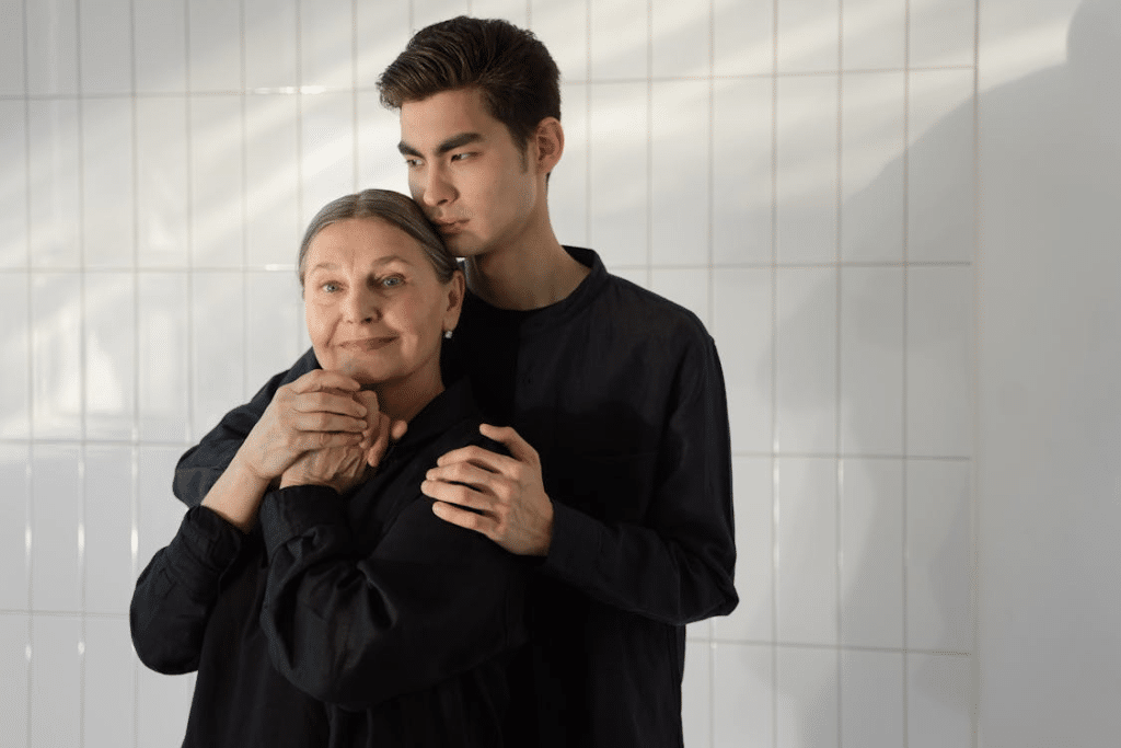 A man and a woman wearing black clothes