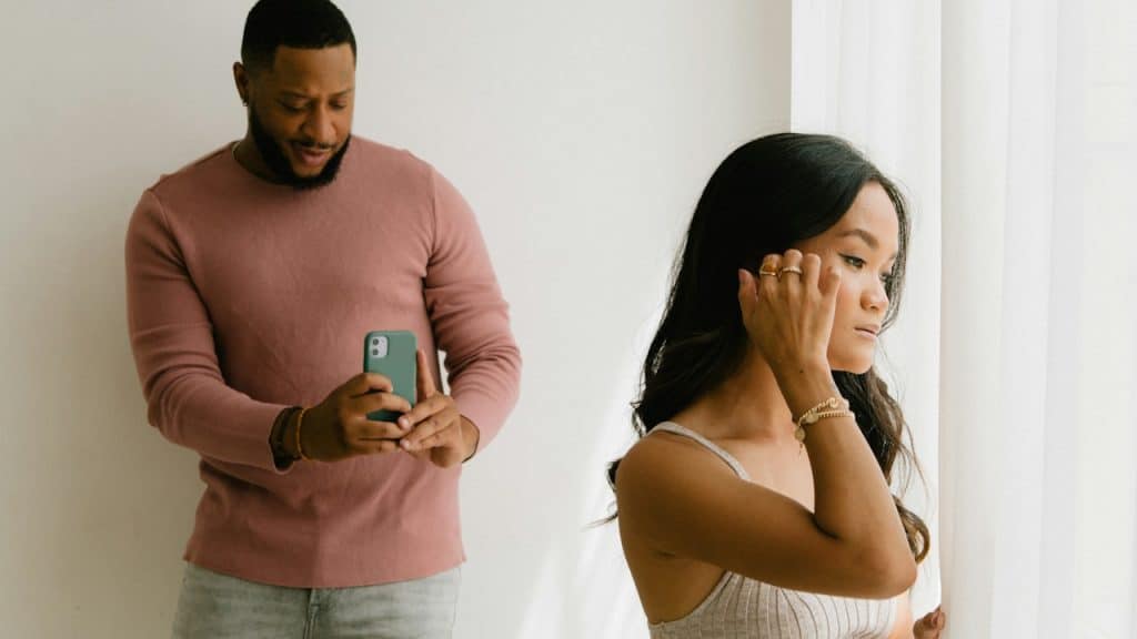 A man taking a picture of his beloved wife from the backside.
