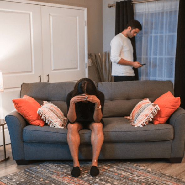 A couple having an argument at home