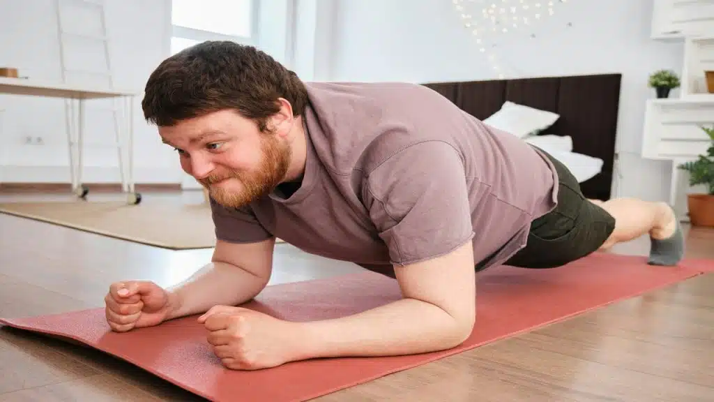 A man exercising at home