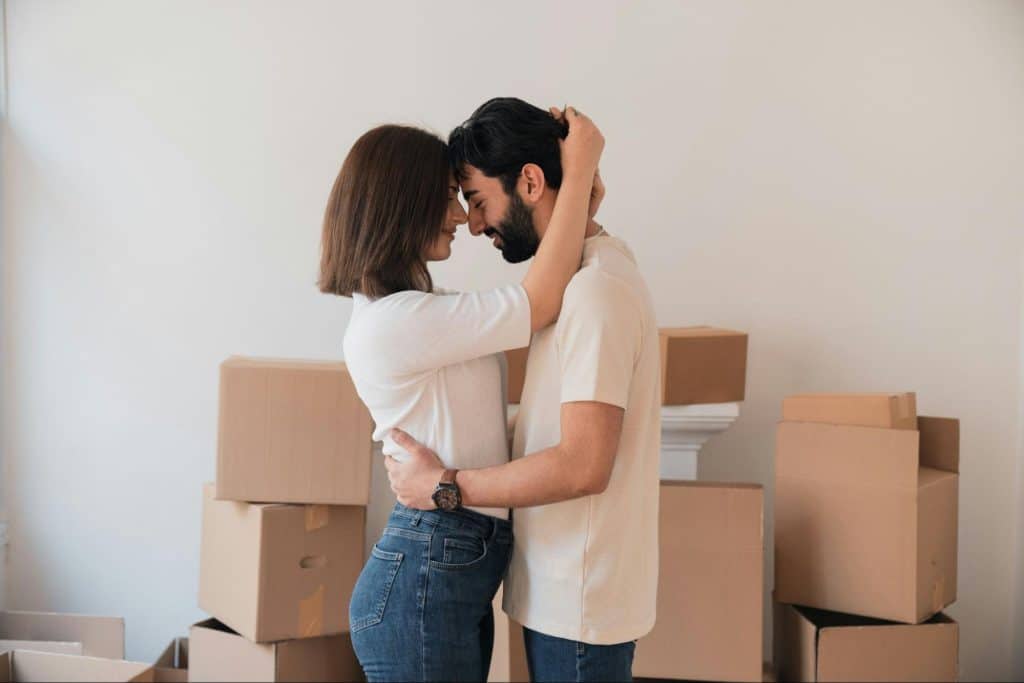 A man and woman facing each other