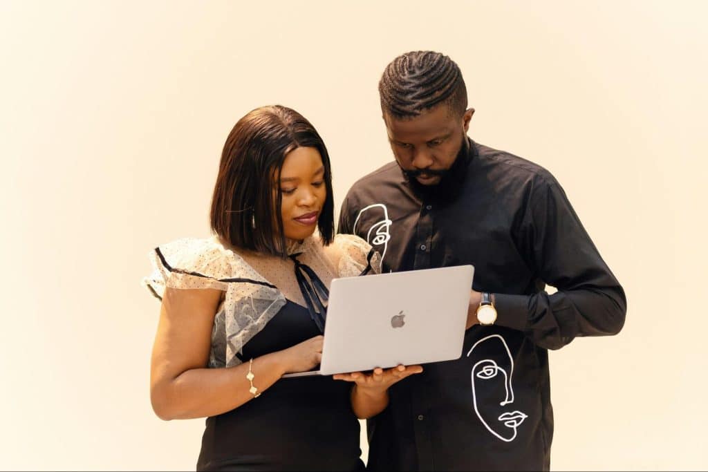 A couple looking at the laptop