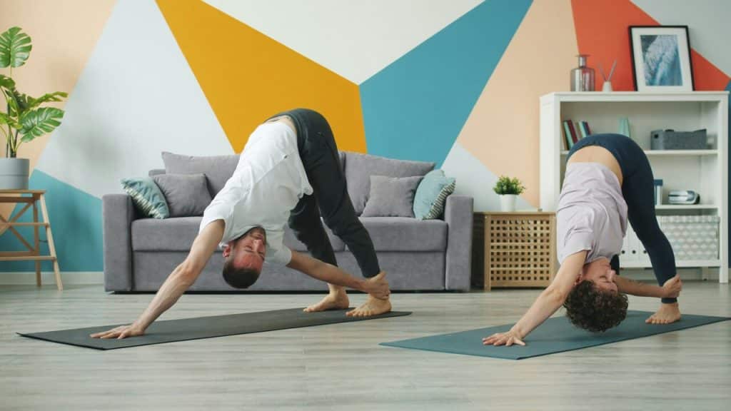 A couple doing yoga together