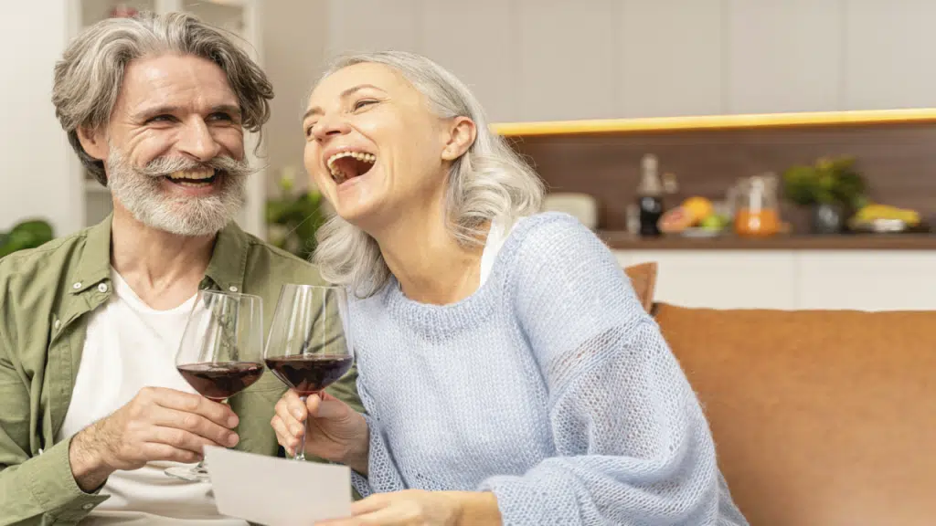 A mature couple having wine