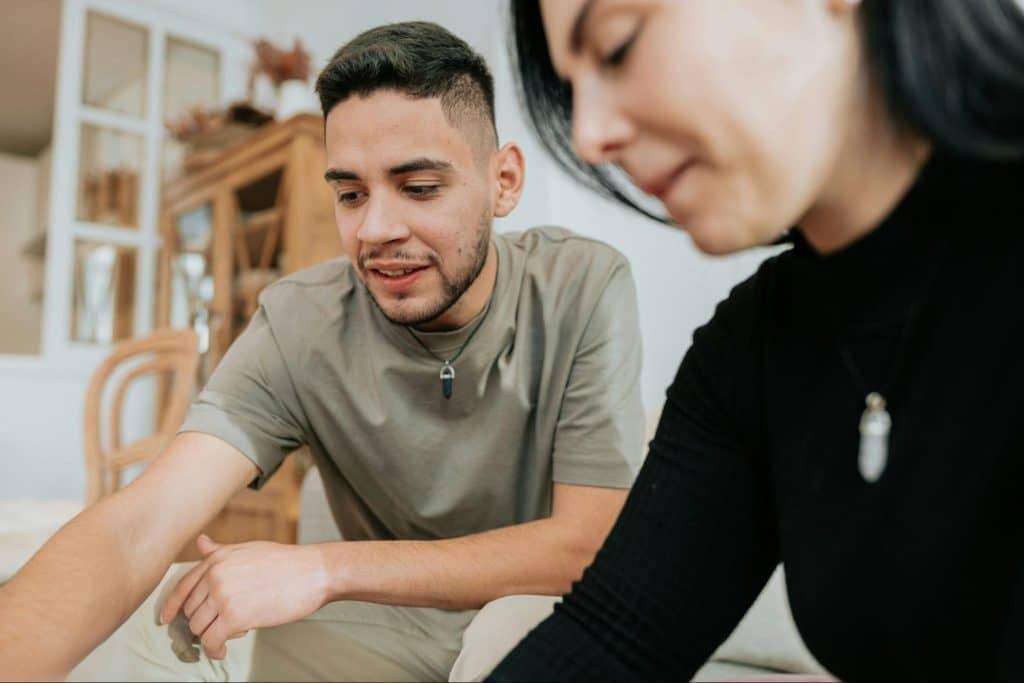 A man explaining something to woman