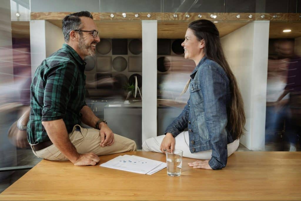 A man and woman talking
