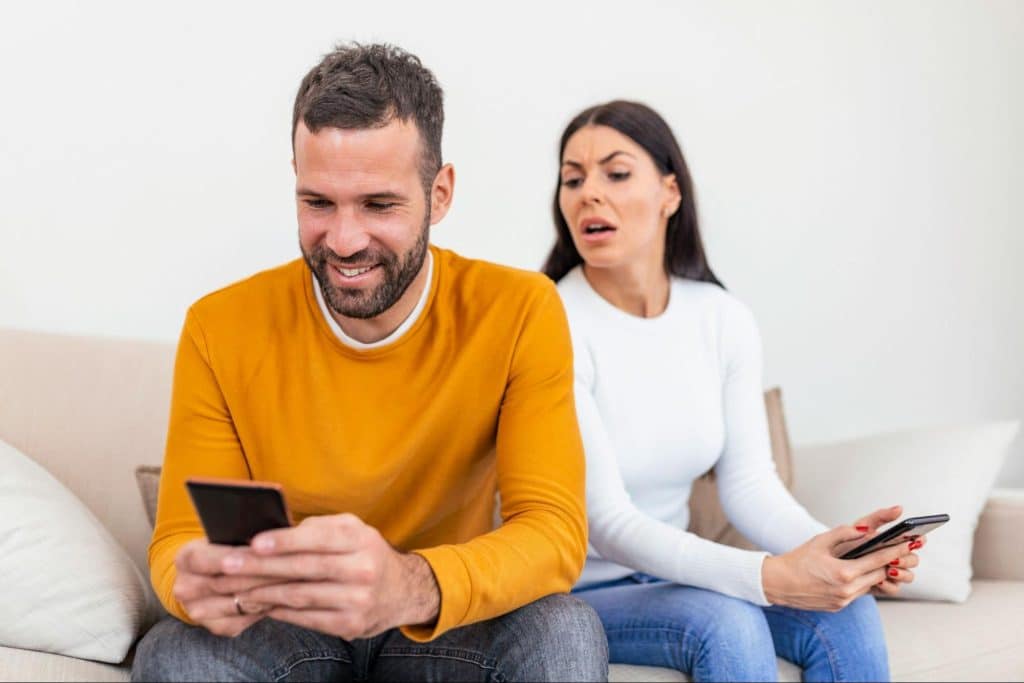 A man not giving attention to a woman
