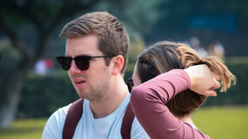 A man and woman standing next to each other.