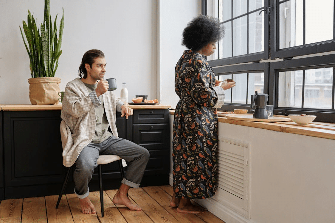 Couple having breakfast at home