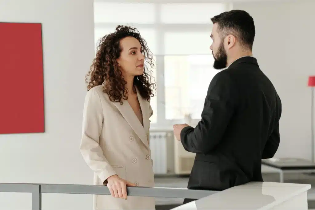 A man and woman talking