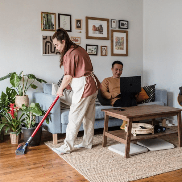 A woman cleaning the house
