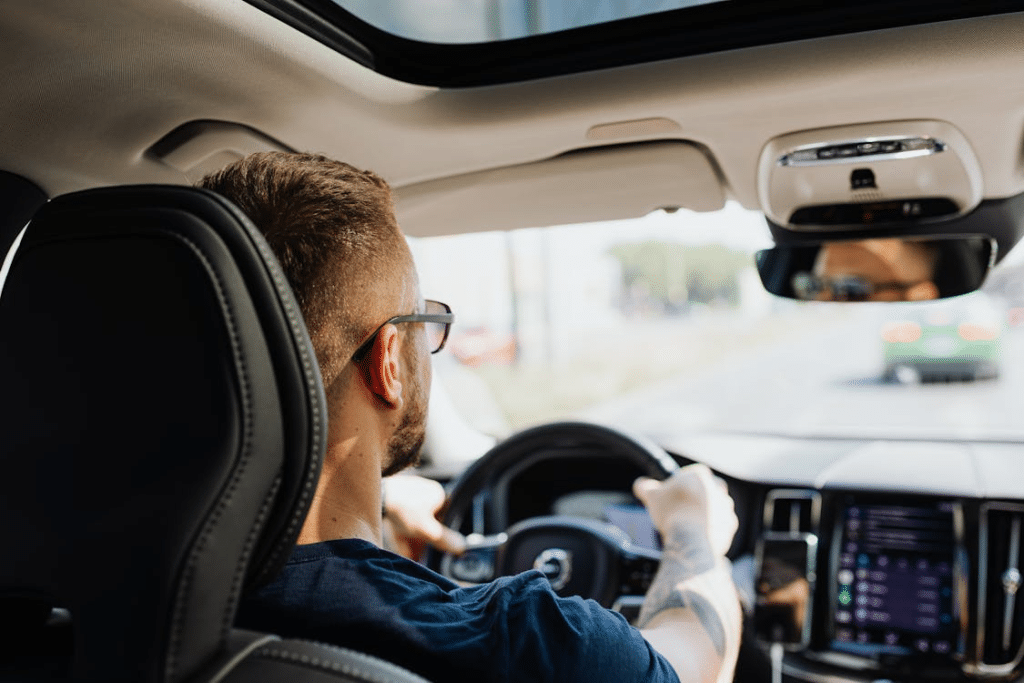 A man driving a car