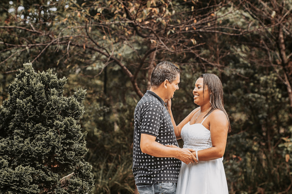 A man and woman facing each other