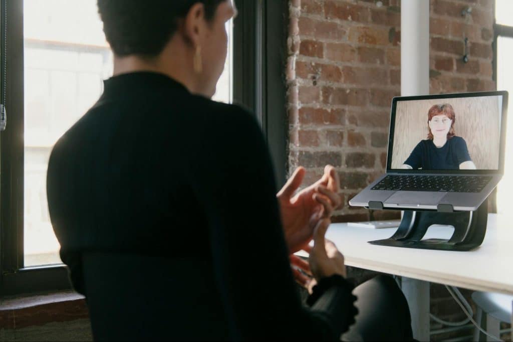 A man having a video call to woman