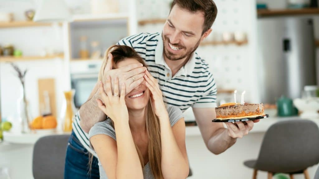 A man surprises his wife on her birthday.