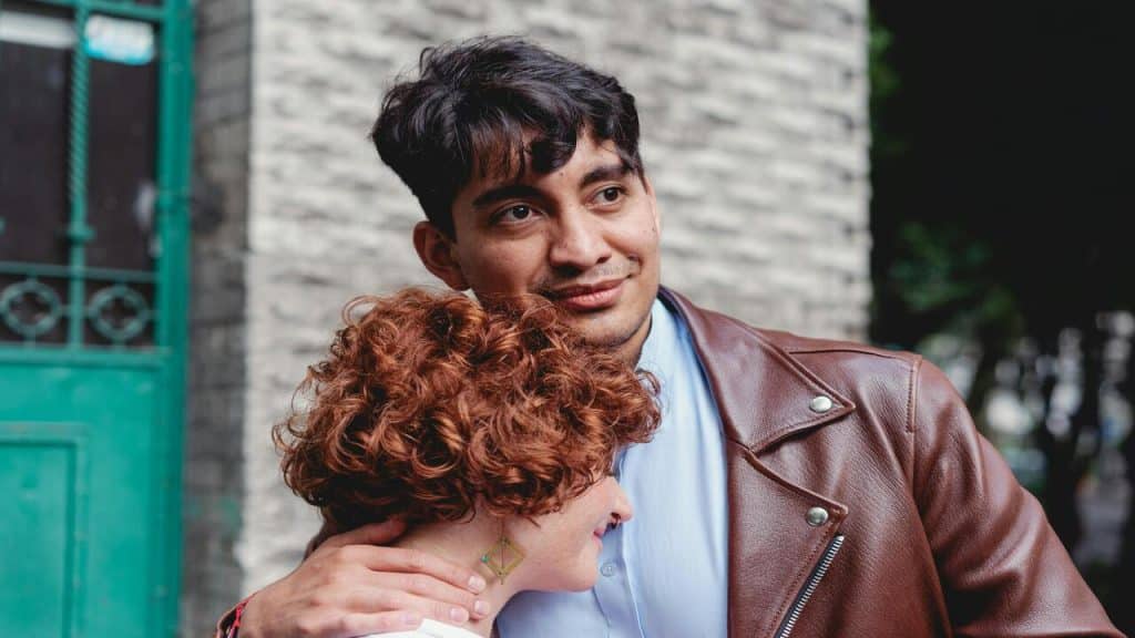 A couple friendly hugging