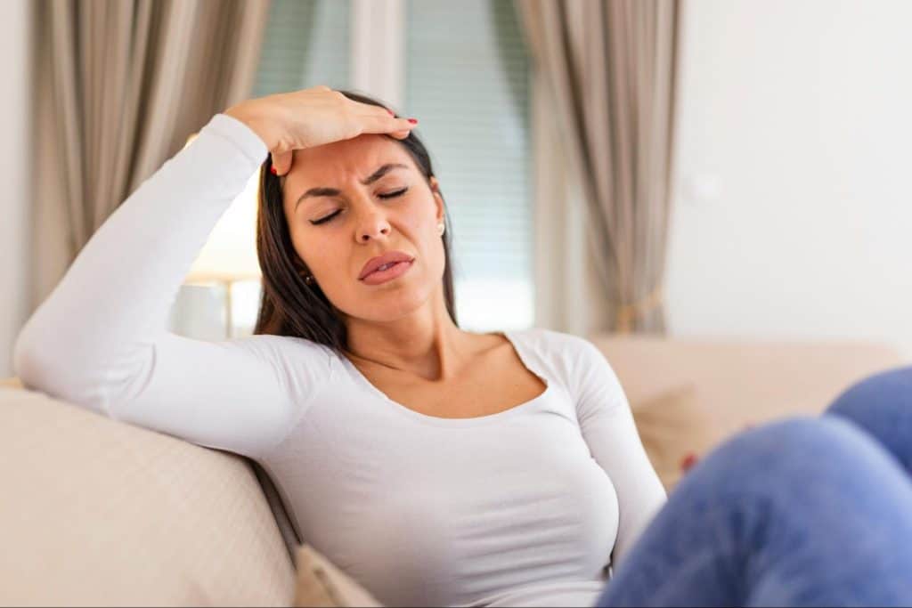 A woman having a headache