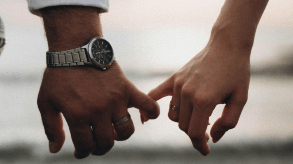 A couple doing the pinky promise