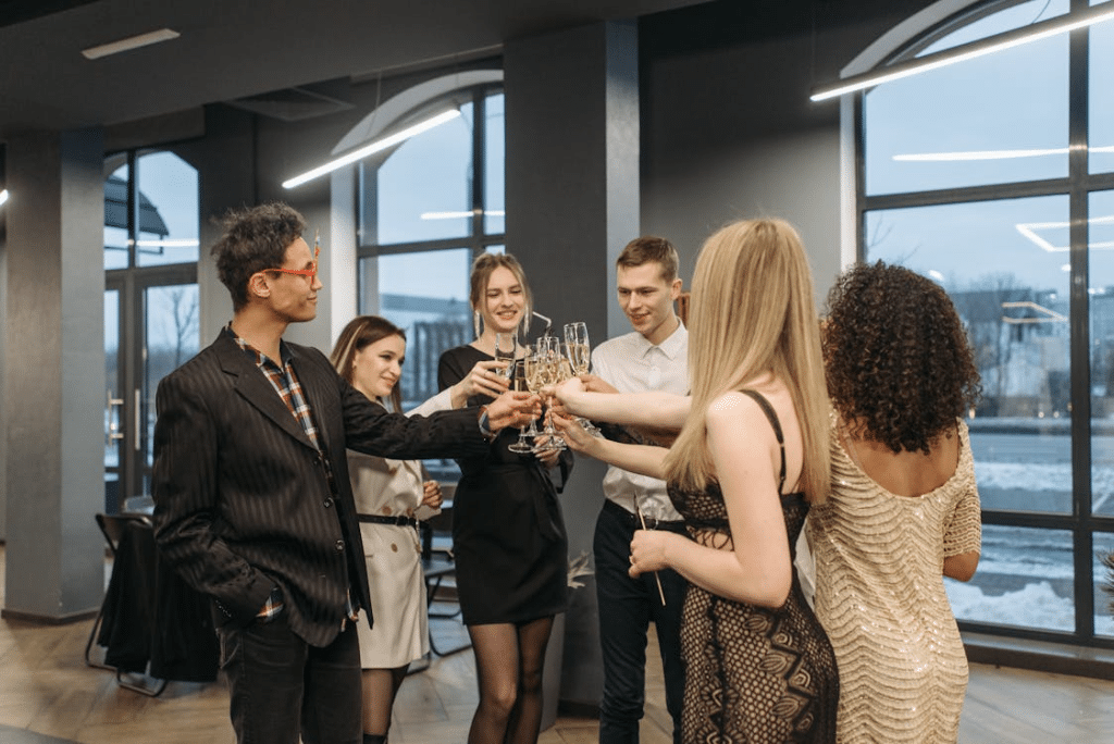 Group of men and women doing a glass toast