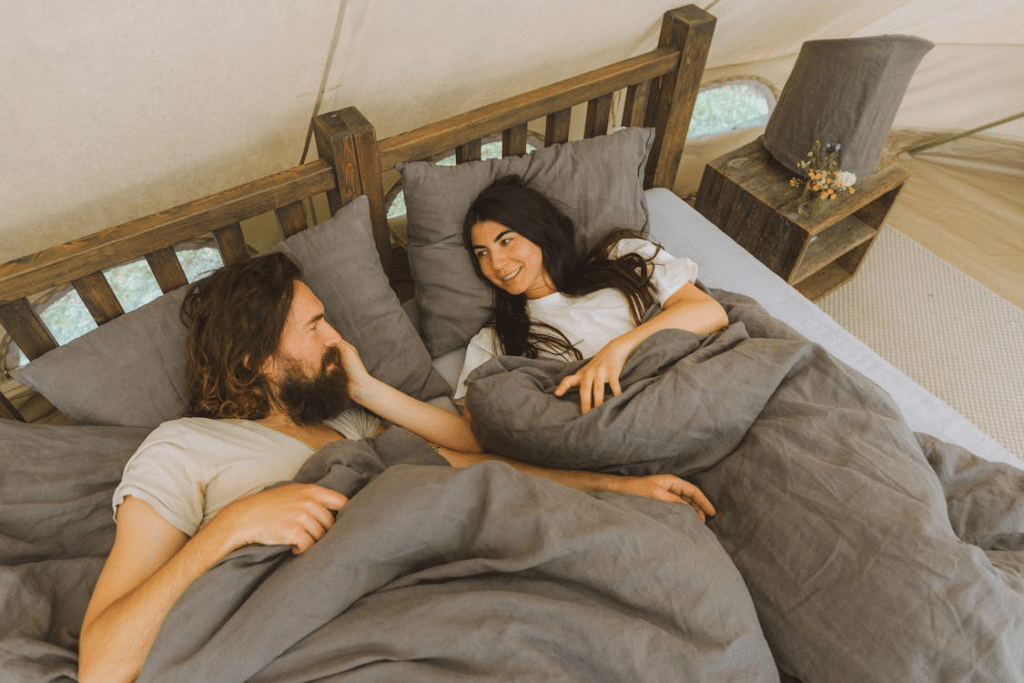 A couple lying in bed