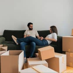 A man and woman at the sofa