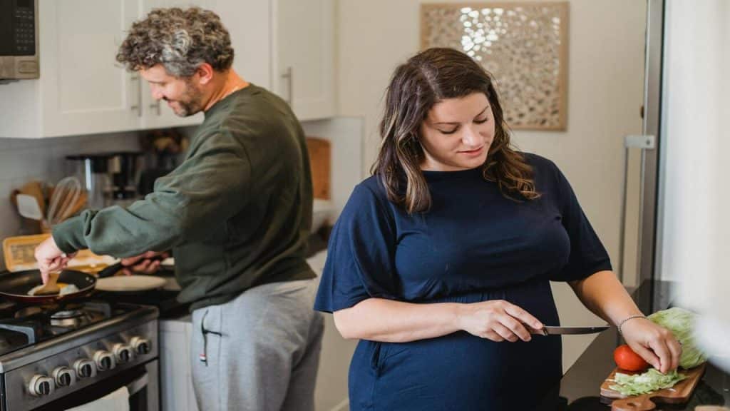 A couple cooking together
