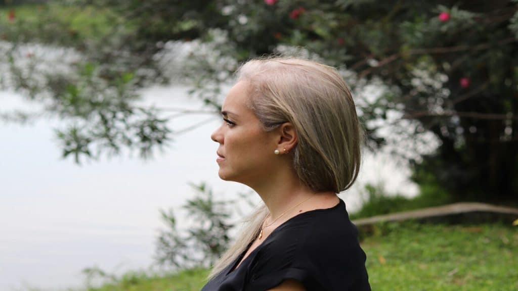 A woman by a body of water