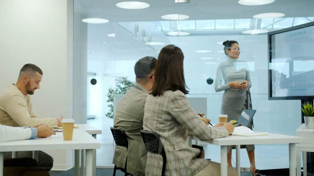 Colleagues listening to a presentation