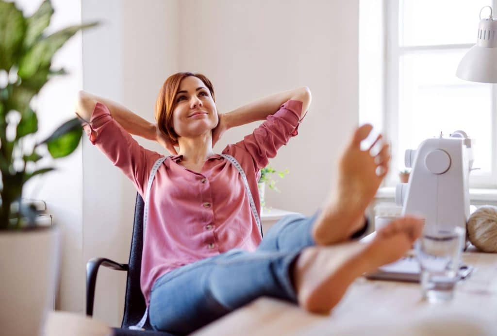 A woman relaxing at the chair