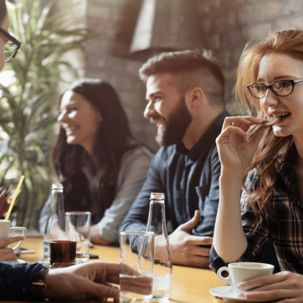 A woman looking at her colleague